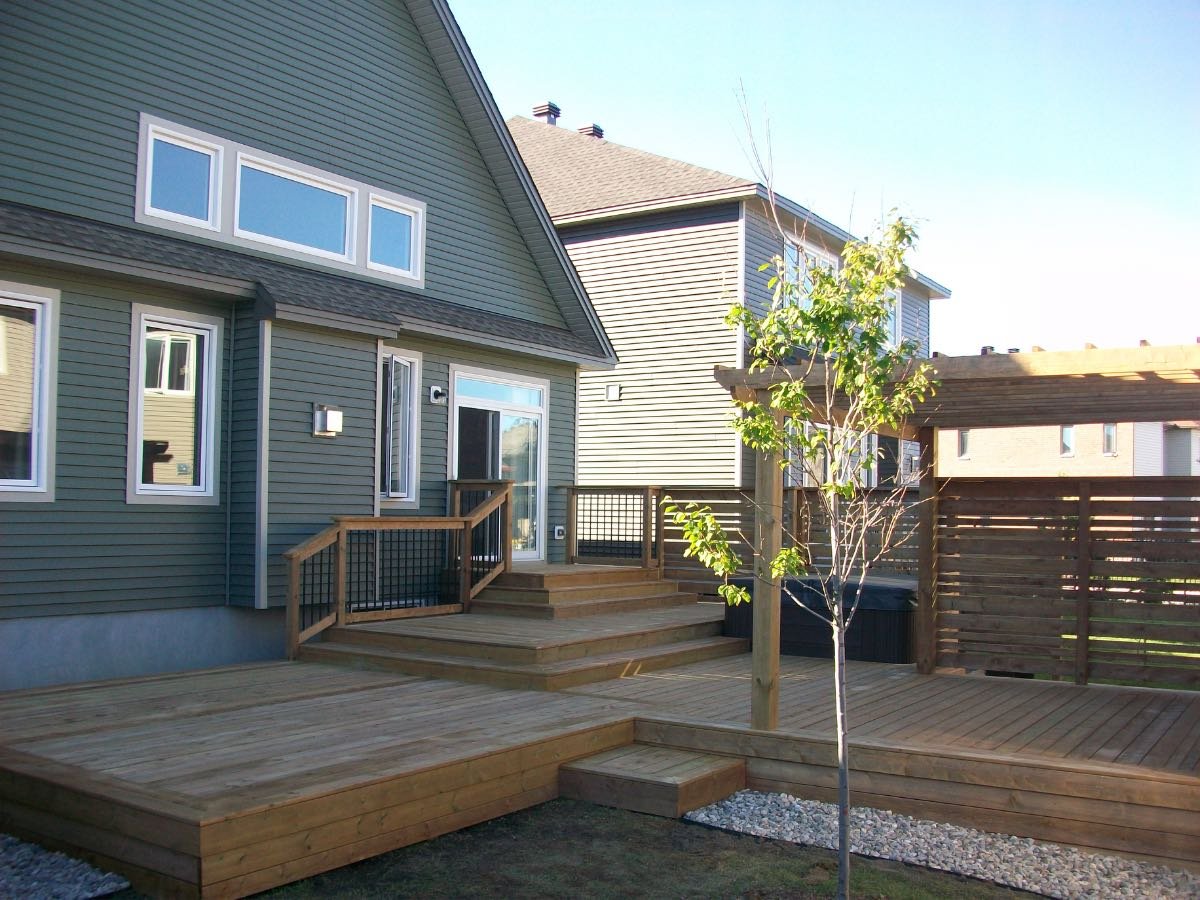 Multi-level deck with a pergola at golden hour