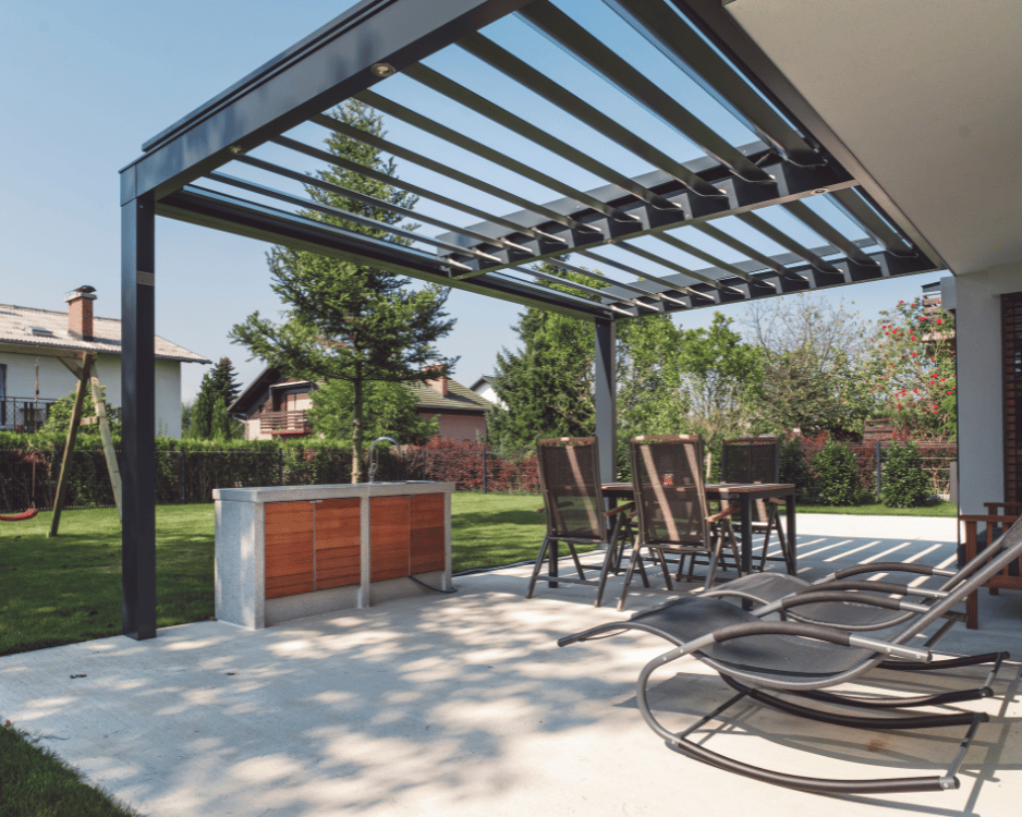 Wood pergola installation over backyard patio providing shade and style in Ottawa